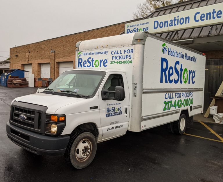 Danville ReStore truck backed up to the building to drop off donations.